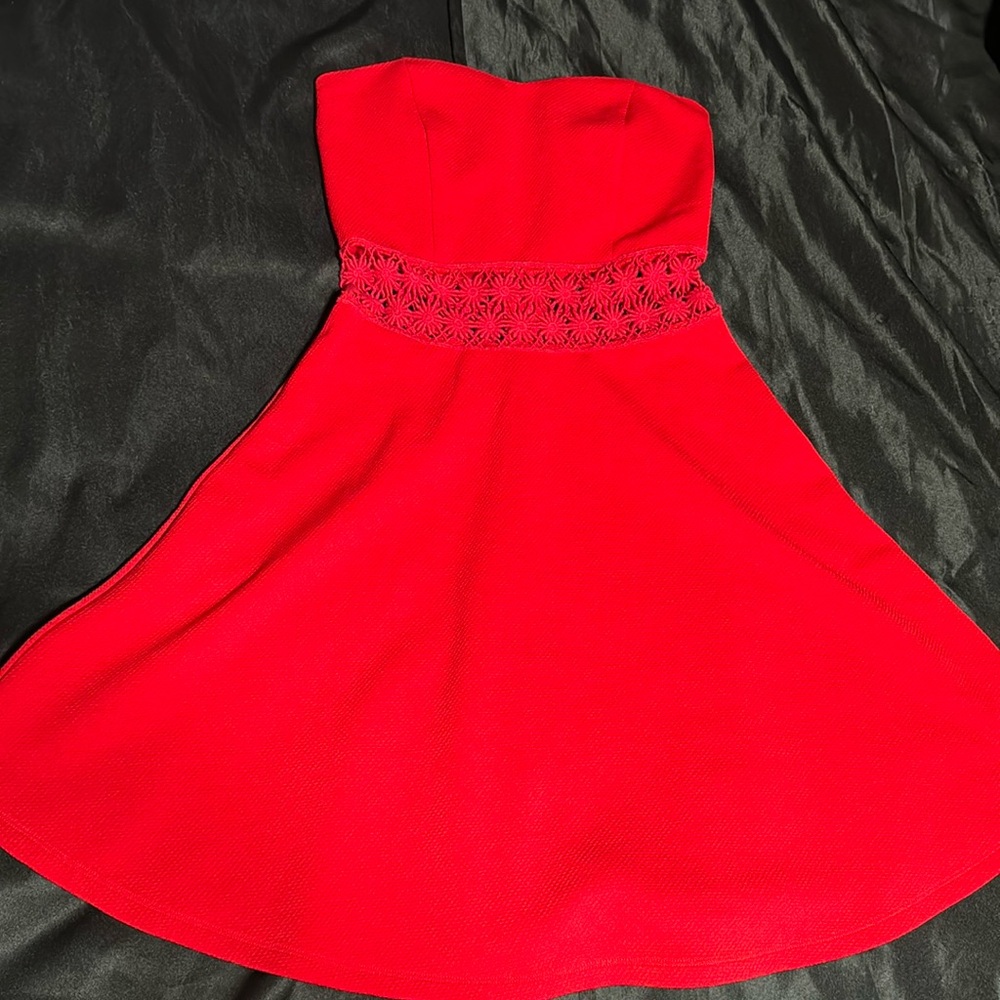 Red baileyblue strapless dress with flower rib design.